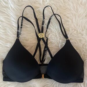Preowned Victoria’s Secret black strappy bra size 32D